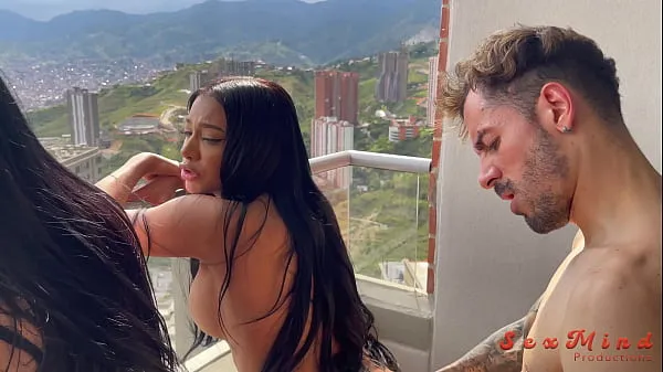 Yenifer Chacon and a delicious Venezuelan brunette girl with big tits having hardcore sex with their coach on a balcony