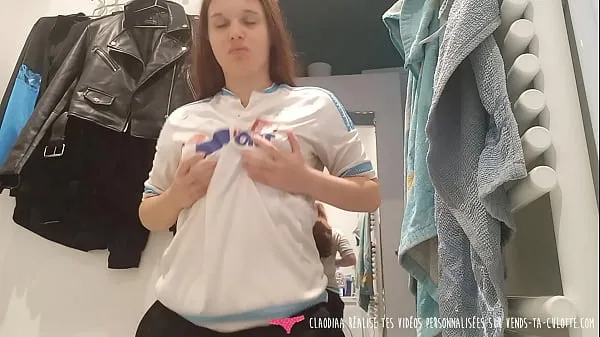 Sexy amateur girl playing with a dildo in a football jersey